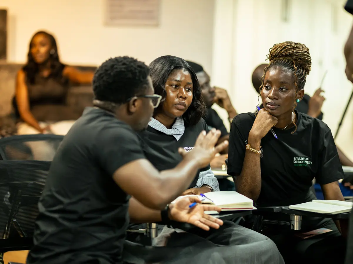 A small team working through a climate enterprise challenge